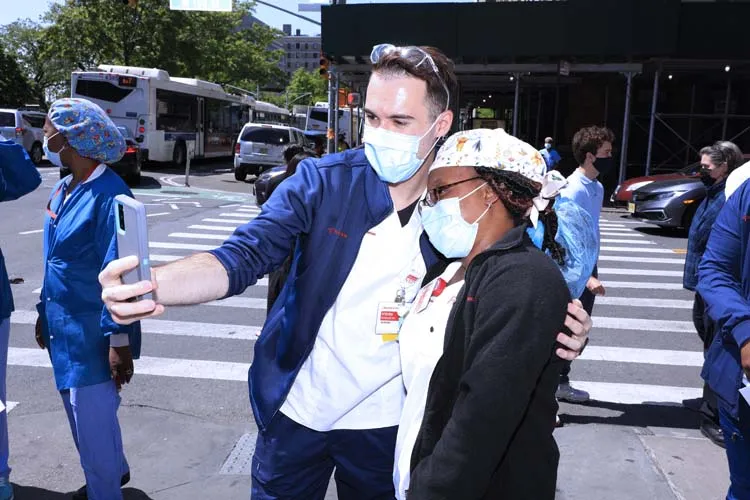 group of medical professionals standing for a photo