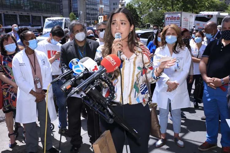 woman speaking at podium
