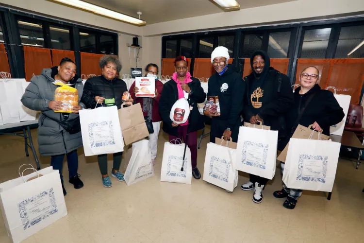 For the past seven years, Columbia Facilities and Operations (CUFO) has donated Thanksgiving meals to older adults throughout Upper Manhattan. This year—as many families struggle with rising food costs and food insecurity—CUFO teamed up with Skanska USA to donate and distribute 300 meal kits to families in the Grant and Manhattanville Houses. Photo credit: Michael DiVito