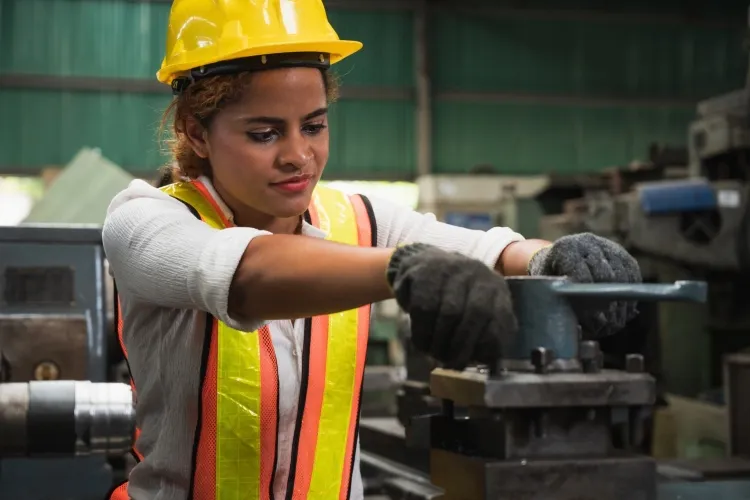 Woman in construction hat.
