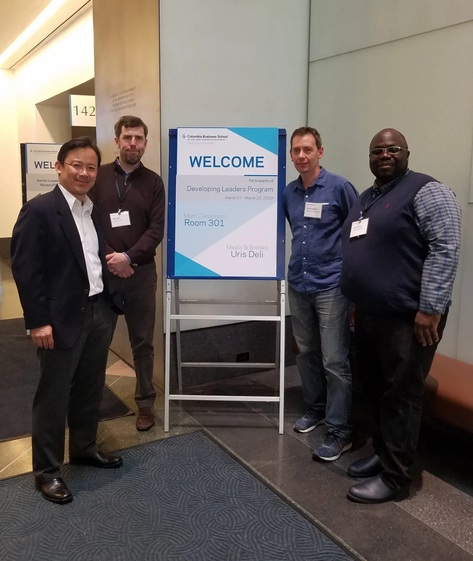 Matthew Bull, Thomas Perry, and Chris Pellettieri with their instructor, Professor Michel Tuan Pham