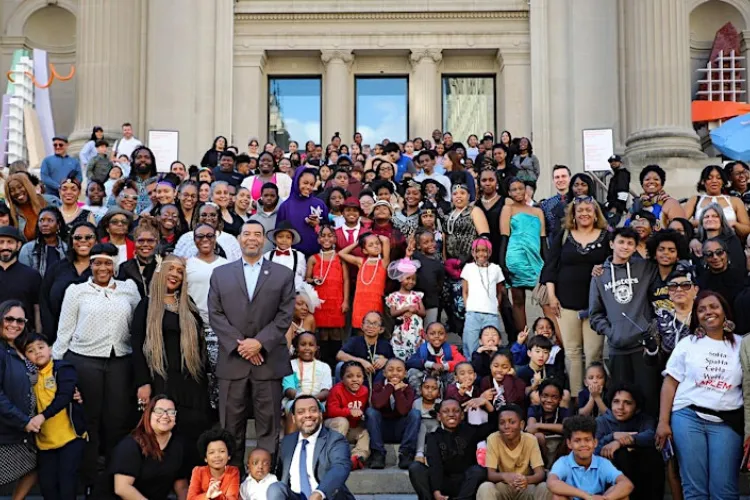 Harlem Community School District 5 Superintendent Dr. Sean L. Davenport with students and educators.