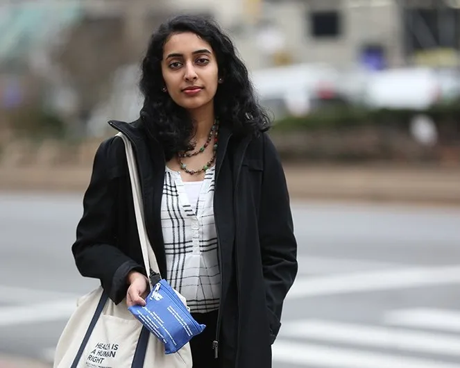 Columbia student Sonalee Rau saved the life of a man in East Harlem who overdosed from opioids. She never goes out without the blue kit that carries the overdose-reversal drug Narcan strapped to her bag. Photo: Bruce Gilbert