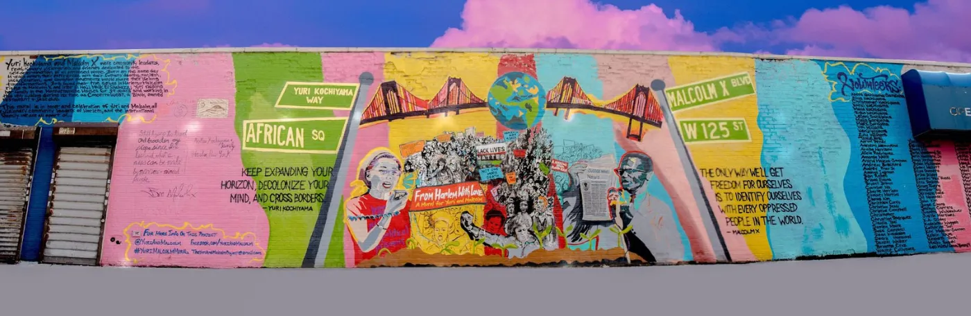 'From Harlem With Love: A Mural For Yuri And Malcolm' mural on the corner of 125th Street and Old Broadway. Photo credit: From Harlem With Love: A Mural For Yuri And Malcolm Project 