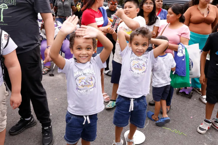 Youth were all smiles at the 10th Annual 'Back-2-School' Block Party in Harlem. Photo Credit: Michael DiVito