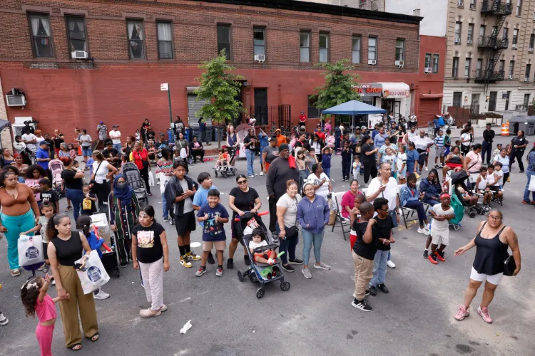 Scores of local residents celebrated the start of a new academic year at the 10th Annual 'Back-2-School' Block Party in Harlem. Photo Credit: Michael DiVito