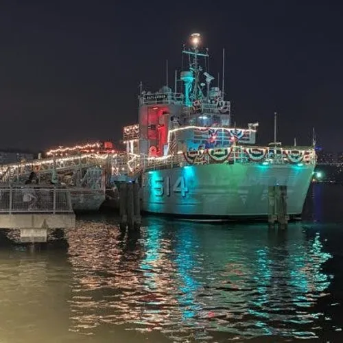 Ship at night in New York's Hudson River off of 125th Street.