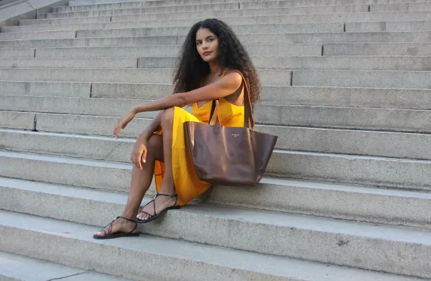 The New York City-based handbag brand was founded on the pillars of style, sustainability, and social impact. Photo credit: Couleurs NY