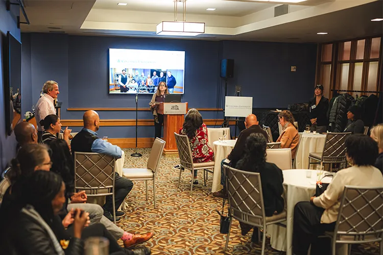 Deborah Sack shares remarks with a room full of Bundles Scholars. 
