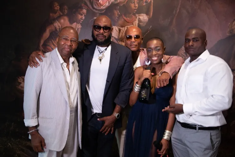 Group of people at the 2021 Harlem Week gala, smiling for a photo