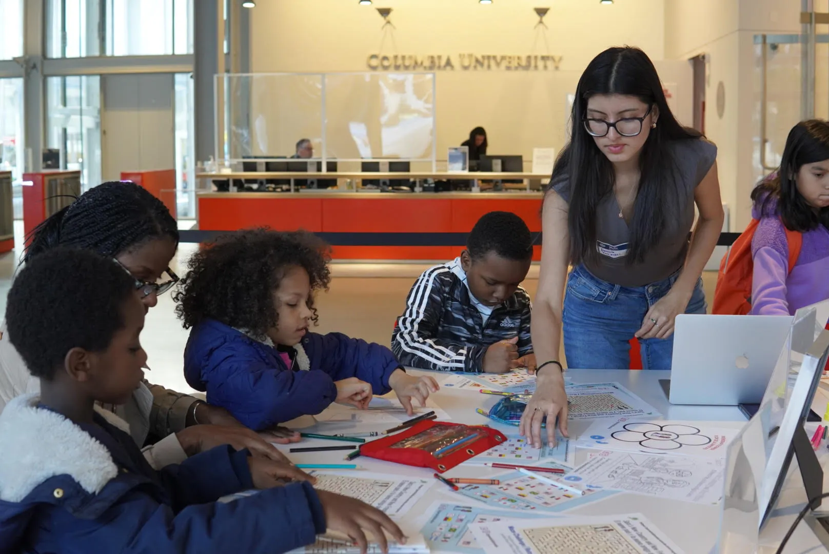 Daniela Palacios works with young learners at Manhattanville Community Day.