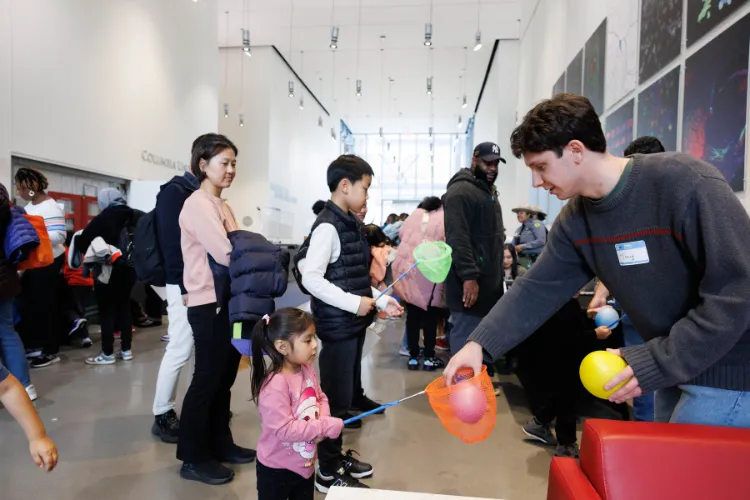 The Jerome L. Greene Science Center was filled with immersive STEM education activities for local youth and their families. Photo credit: Sirin Samman