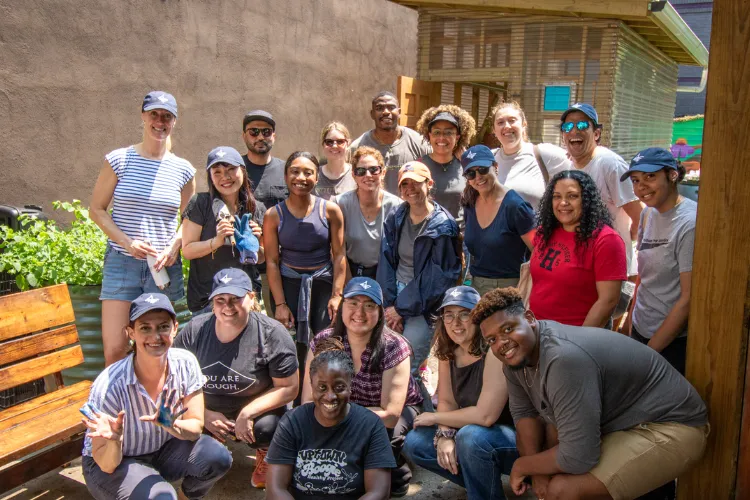 Columbia Business School staff members volunteered at the Saint Nicholas Miracle Garden as part of Community Service Day in June. Photo credit: Columbia Business School
