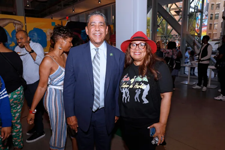 Representative Adriano Espaillat and New York Women's Chamber of Commerce President Quenia Abreu at Taste of Harlem 2023.