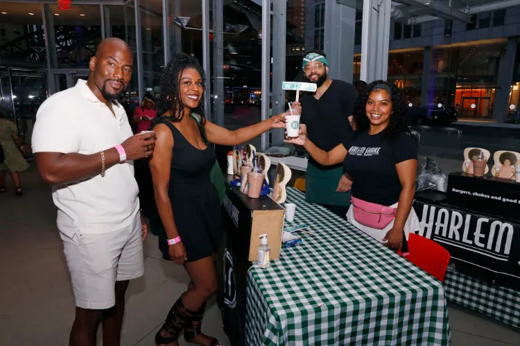 Beyond its burgers, Harlem Shake's milkshakes are a neighborhood staple. The eatery's co-owner DarDra Coaxum and her team shared them with attendees at Taste of Harlem 2025. Photo credit: Michael DiVito